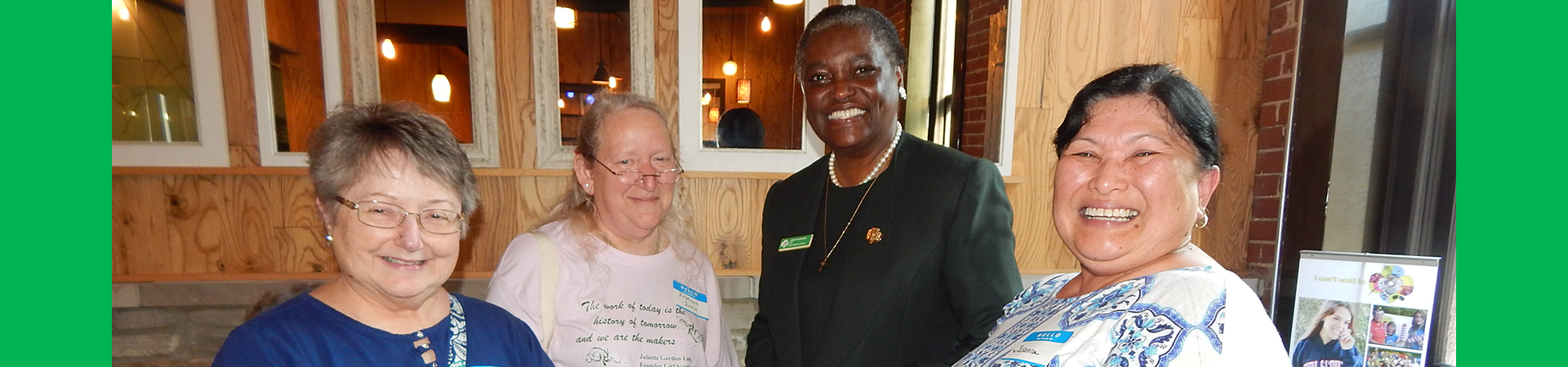  loretta graham posing with gsofsi alums at a leading ladies event 