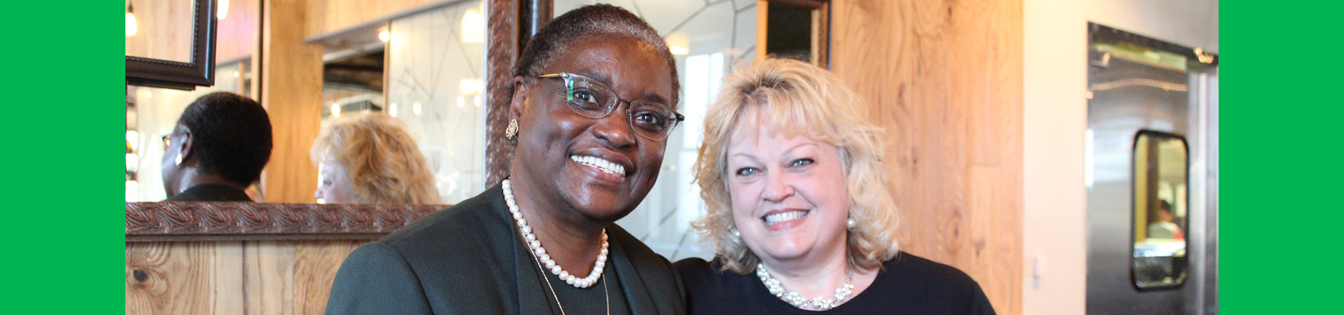  loretta graham posing with girl scout leader and alum 